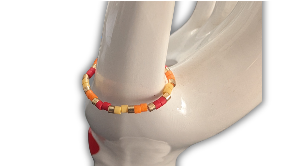 Bague Élastique Fine en Perles de Verre – Teintes Chaleureuses (Jaune, Orange & Rouge Brique)